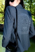 Vavy Blazer - Structured straight-cut tailored blazer with skull rhinestones and button fastening.