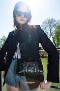 Sunny Mood Punk Bag - Small vintage-inspired patent leather bag with adjustable shoulder strap and punk wings and tag signature.