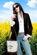 Z Bucket Voltaire Bag - Canvas and grained leather bucket bag with adjustable strap and wing signature.