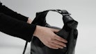 Le Cecilia Bag - Woman’s burgundy vegetable-tanned leather bag with shoulder strap and metal C buckle