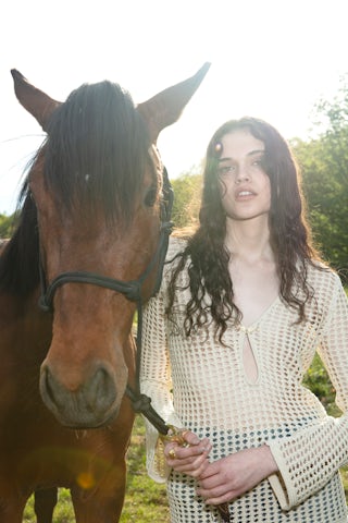 Rany Jumper - Crochet jumper with metallic wing clasp and rhinestones.