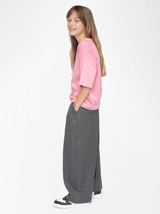 Aline Girl's T-shirt - Round neck t-shirt, loose fit, "Wild Love" rhinestone print on front.