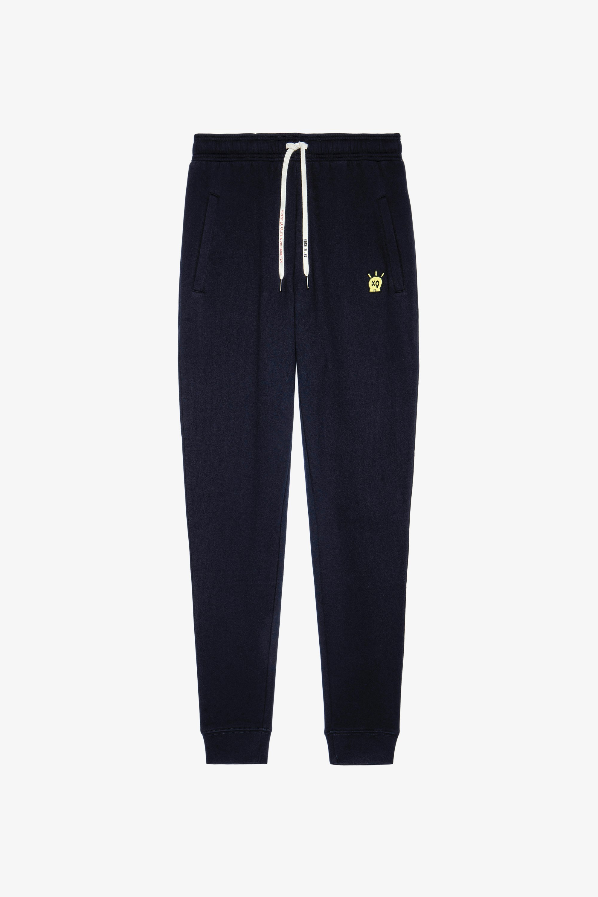 Capri Skull Trousers Men's fleece tracksuit bottoms in ink colour with skull patch. This product is GOTS certified and made with fibers from organic farming.