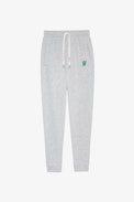 Hose Capri Skull - Grau melierter Herren-Jogginganzug aus Fleece mit Totenkopfaufnäher. Dieses Produkt ist nach GOTS zertifiziert und aus Fasern aus biologischem Anbau hergestellt.
