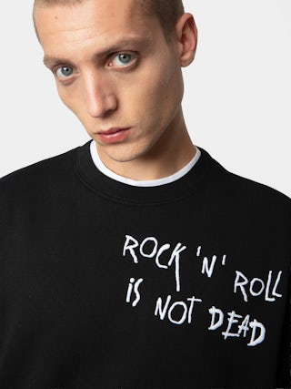 Sweatshirt Aime - Sweatshirt molletonné en coton biologique noir à manches longues et broderie "Rock'N'Roll Is Not Dead".