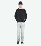 Sudadera Uppy - Sudadera de manga larga raglan con estampado en la espalda.