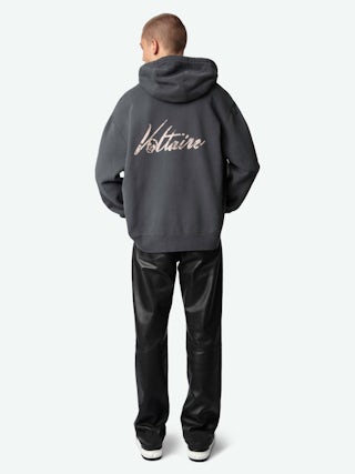 Sacha Sweatshirt - Grey zipped fleece sweatshirt with hood, long sleeves, and "Voltaire" print on the back.