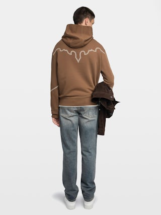 Sweeny Sweatshirt - Long-sleeved hooded sweatshirt with western cutouts.
