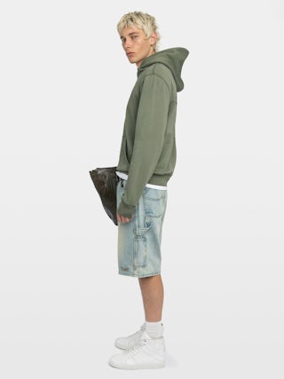 Sanchi Sweatshirt - Long-sleeved hooded sweatshirt with back print.