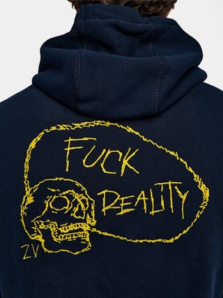 Sweatshirt Sacha - Sweatshirt à capuche avec broderie au dos.