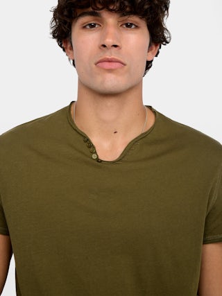 Tunisien Monastir - Tunisien manches courtes orné de patchs au dos.