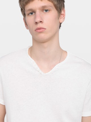 Henley T-shirt Monastir - Short-sleeve henley t-shirt with wing print on the sleeve.