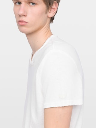 Henley T-shirt Monastir - Short-sleeve henley t-shirt with wing print on the sleeve.