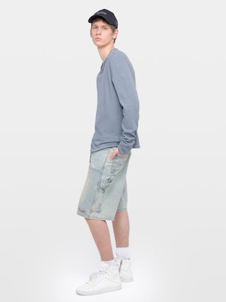 Tunisien Monastir - Tunisien manches longues avec imprimé aile sur la manche.