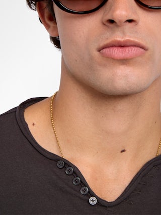 Monsatir Henley T-shirt - Long-sleeved henley t-shirt with print on the back.