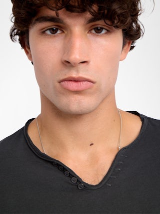 Monsatir Henley T-shirt - Long-sleeved henley t-shirt with front print.