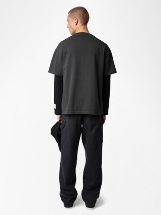 T-shirt Teddy - T-shirt oversized in cotone biologico grigio scuro con maniche corte e stampa "Voltaire".