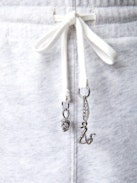 Smile Shorts - Light grey marl cotton shorts with drawstring ties decorated with charms.