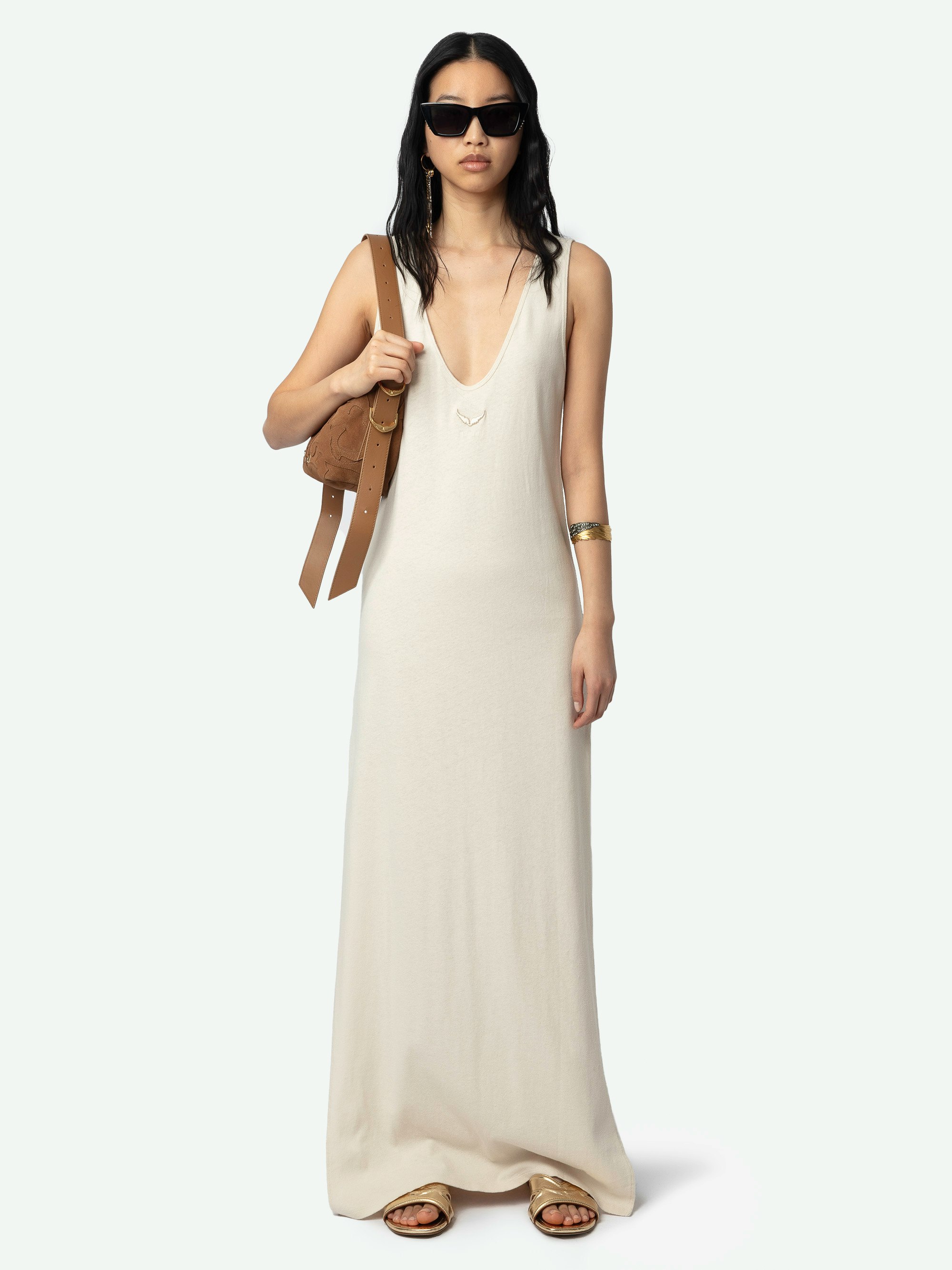 Deva Dress - A harmonious blend of effortless elegance and contemporary edge. This sleeveless, reversible long dress features daring side slits, exuding a free-spirited allure that embodies the brand's signature rock 'n' roll-inspired style. The Deva Dress is designed for the modern woman who embraces both comfort and chic sophistication.