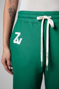 Jogginghose Steevy - Damen-Jogginghose aus grüner Baumwolle. Dieses Produkt ist nach GOTS zertifiziert und aus Fasern aus biologischem Anbau hergestellt.