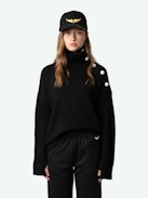 Pantaloni da Jogging Chill - Pantaloni neri da jogging dritti e ampi, tasche con cerniera a contrasto e ricamo con ali distintive.
