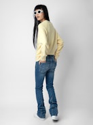 Jumper Upper - Light yellow long-sleeved sweatshirt with insignia and customised details designed by Humberto Cruz.