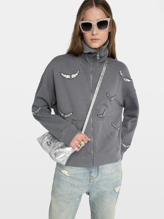 Milly Sweatshirt - Sweatshirt with zip closure, high collar and long sleeves with wing embroidery.