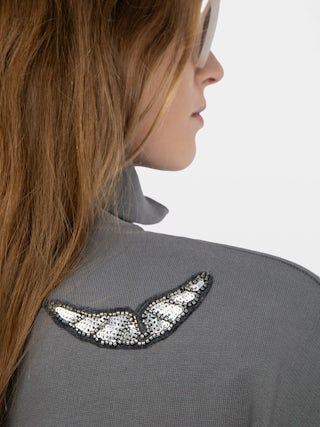 Milly Sweatshirt - Sweatshirt with zip closure, high collar and long sleeves with wing embroidery.
