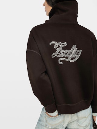 Maya Sweatshirt - Sweatshirt with high collar and zip closure with embroidery and rhinestones on back.