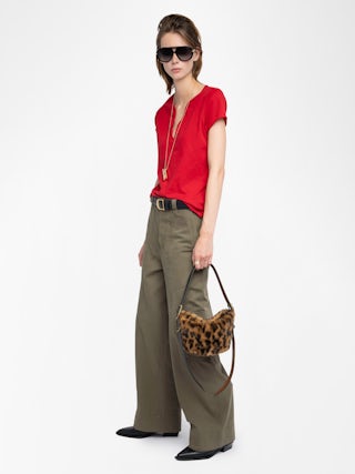 Tuni Henley T-shirt - Short-sleeved Henley T-shirt with rhinestone wings on back.