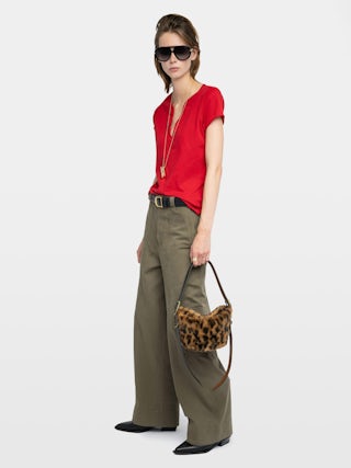 Tuni Henley T-shirt - Short-sleeved Henley T-shirt with rhinestone wings on back.