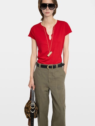 Tuni Henley T-shirt - Short-sleeved Henley T-shirt with rhinestone wings on back.