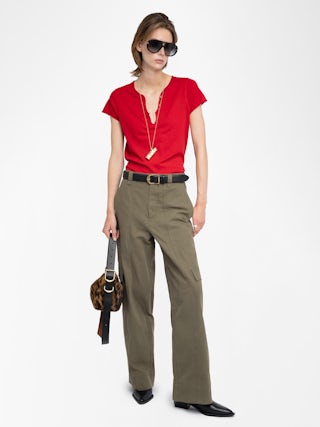 Tuni Henley T-shirt - Short-sleeved Henley T-shirt with rhinestone wings on back.