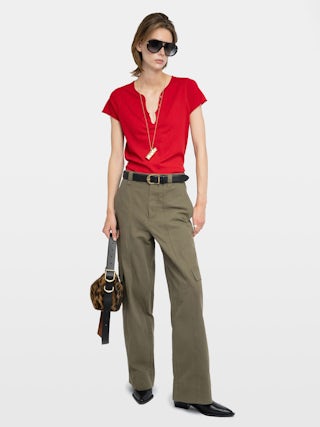 Tuni Henley T-shirt - Short-sleeved Henley T-shirt with rhinestone wings on back.