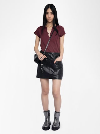 Henley T-Shirt - Henley T-shirt with short sleeves featuring embroidery and rhinestones on the back.