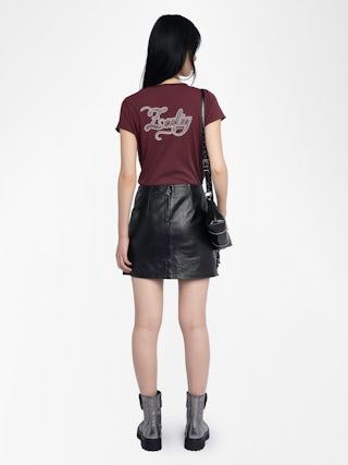 Henley T-Shirt - Henley T-shirt with short sleeves featuring embroidery and rhinestones on the back.