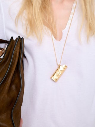 Tuni Henley T-shirt - Long-sleeved henley t-shirt top with rhinestone wings.