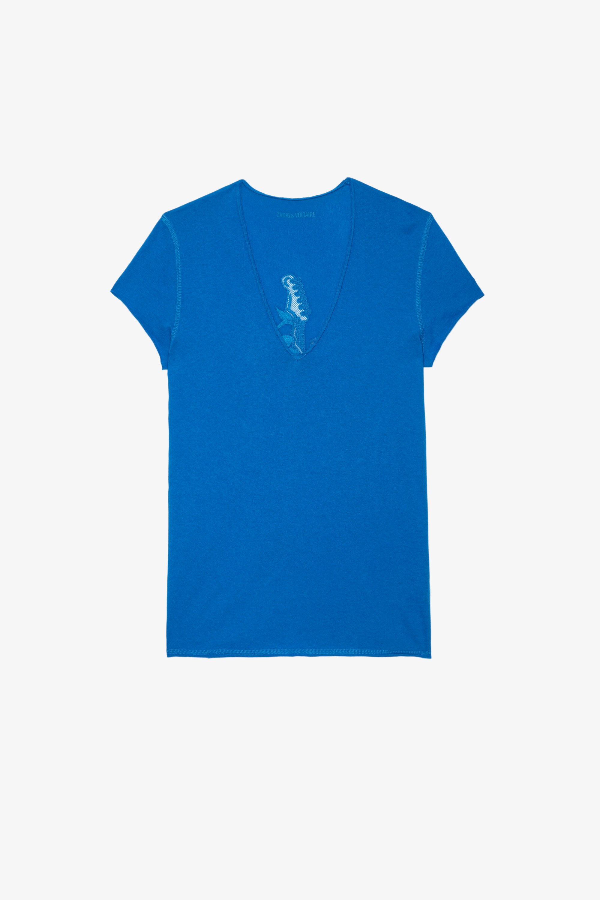 Guitar Mesh Story T-Shirt Women’s blue cotton T-shirt with a V neckline and short sleeves and featuring a guitar motif on the back