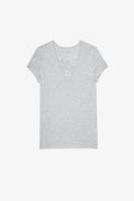 Camiseta Story Fishnet Skull Flowers - Camiseta de algodón gris con bordados e inserciones de rejilla en la espalda para mujer
