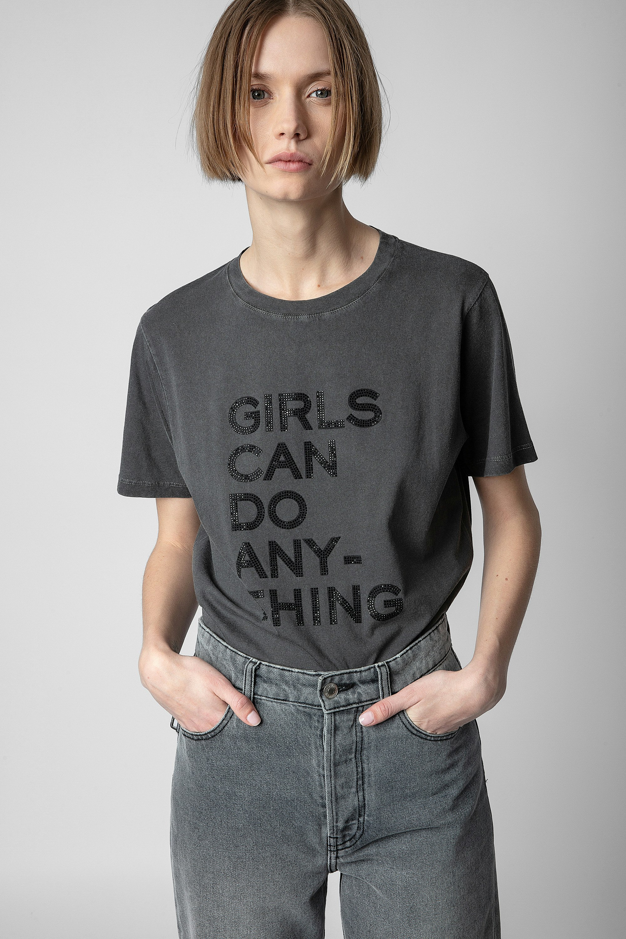 Camiseta Bella - Camiseta gris de algodón para mujer con mensaje «Girls can do anything» engastado con strass