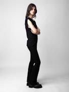 Donate Jewellery T-shirt - Women’s black T-shirt with star buttons.