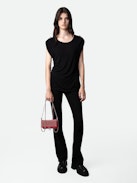 Donate Jewellery T-shirt - Women’s black T-shirt with star buttons.