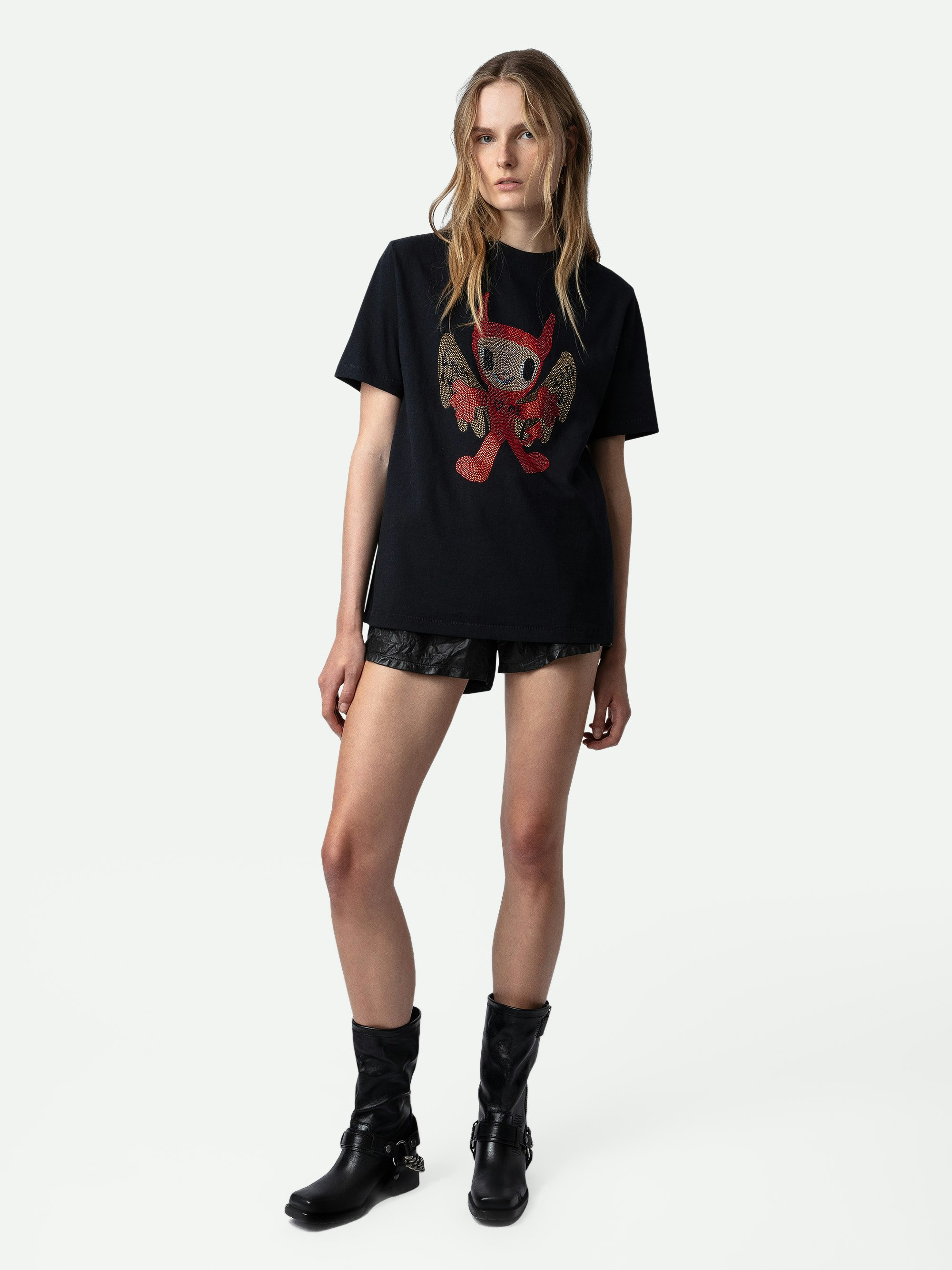 Camiseta Edwin Devil Strass - Camiseta negra de algodón con cuello redondo y mangas cortas, con strass y detalles decorativos de Humberto Cruz.