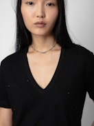 T-shirt Wassa - T-shirt nera con collo a V, maniche corte e strass.