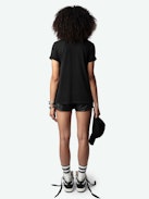 Edwin Hearts T-shirt - Short-sleeved, oversized black organic cotton T-shirt with "Hello Stop Breaking Hearts" flocked on front.
