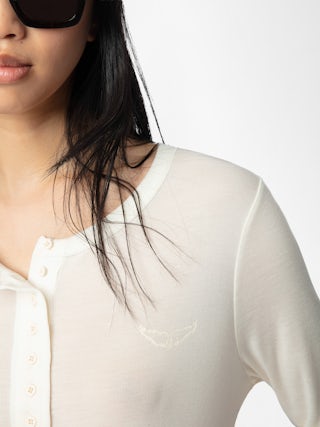 T-shirt Blair - T-shirt à manches longues avec fermeture boutonnée et ailes sur le devant.