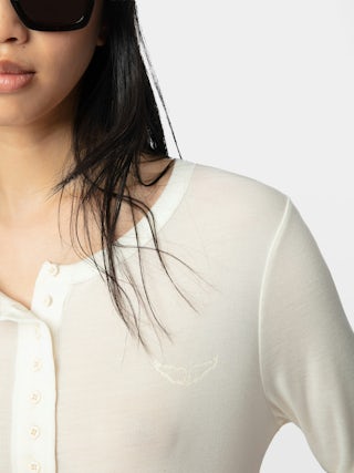 Blair T-shirt - Long-sleeved t-shirt with button fastening and wings on the front.