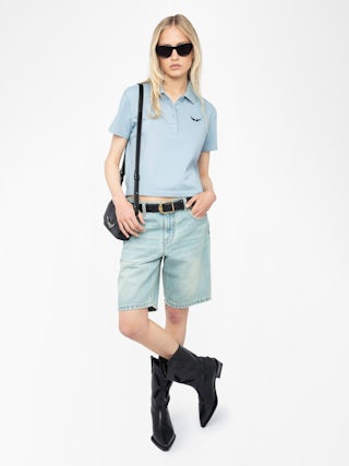 Mirta Cropped Polo Shirt - Short-sleeved cropped polo with embroidered wings on the front.