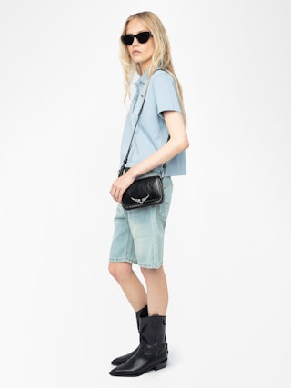 Mirta Cropped Polo Shirt - Short-sleeved cropped polo with embroidered wings on the front.