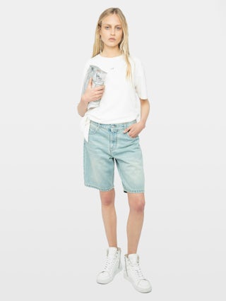 Camiseta Edda - Camiseta asimétrica de manga corta con pedrería en la parte delantera.